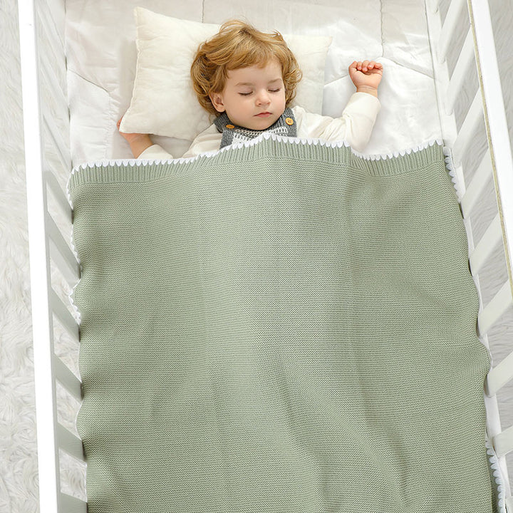 Archer Knitted Baby Blanket. Size 90x70 cm with baby