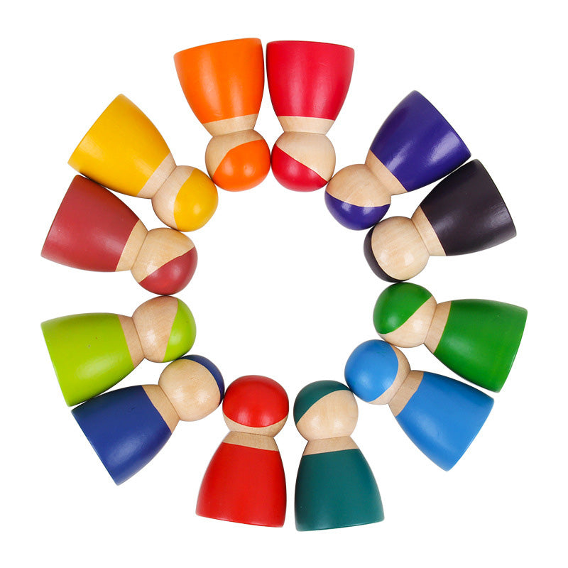 12 Piece Wooden Rainbow Peg Dolls in circle