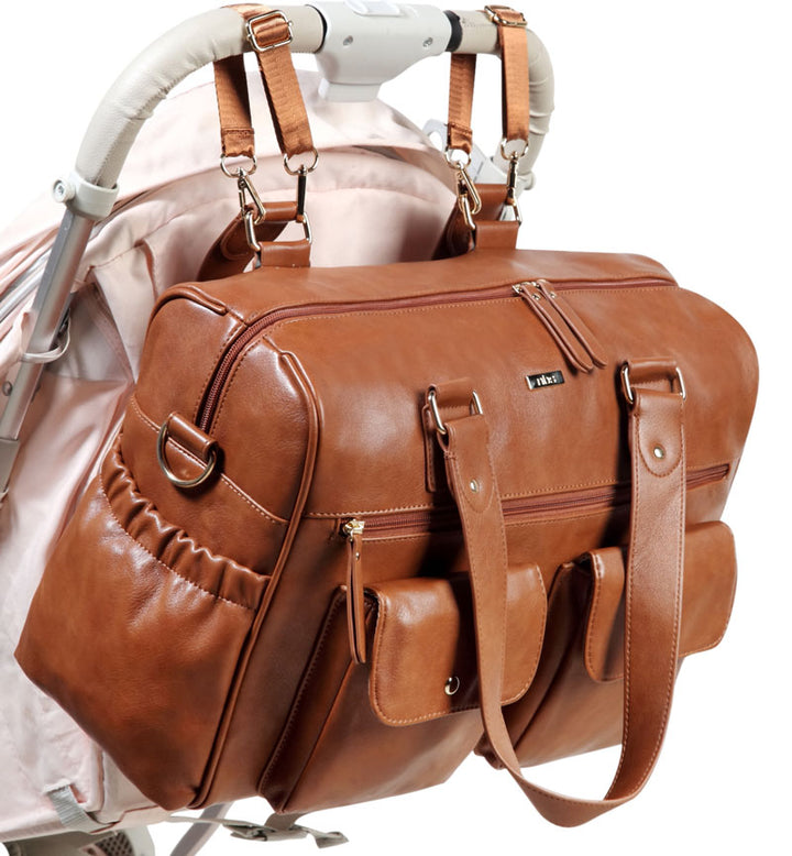 Sarah-Tan-Carry-All-Nappy-Bag---on-pram