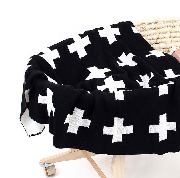 Swiss Cross Baby Blanket in Bassinet