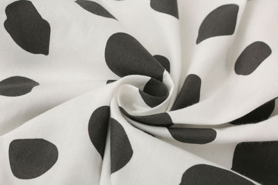 Black Dots Fitted Cot Sheet Closeup