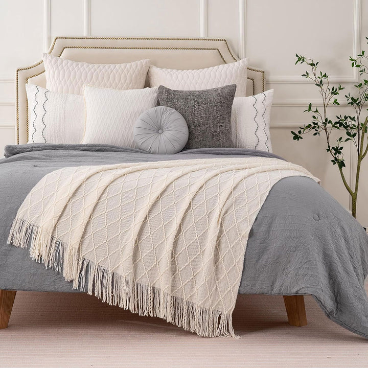 Knit Throw Blanket with Tassels in Cream Color on Bed 1. Size 130-150 cm