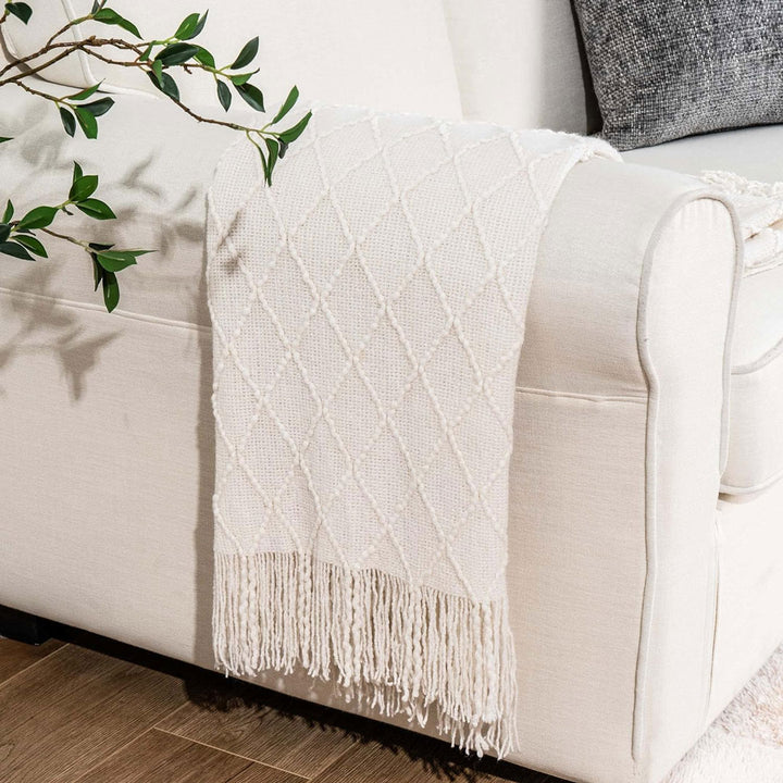 Knit Throw Blanket with Tassels in Cream Color on Sofa 1. Size 130-150 cm