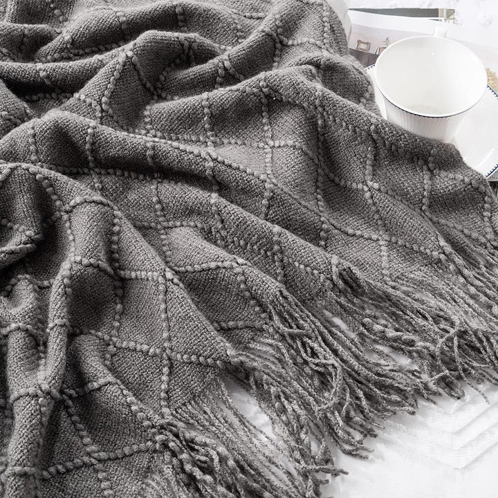 Knit Throw Blanket with Tassels in Grey Color. Tassels closeup. Size 130-150 cm