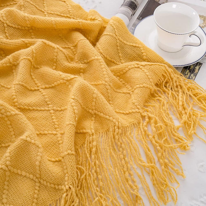Knit Throw Blanket with Tassels in Mustard Color. Tassels closeup. Size 130-150 cm