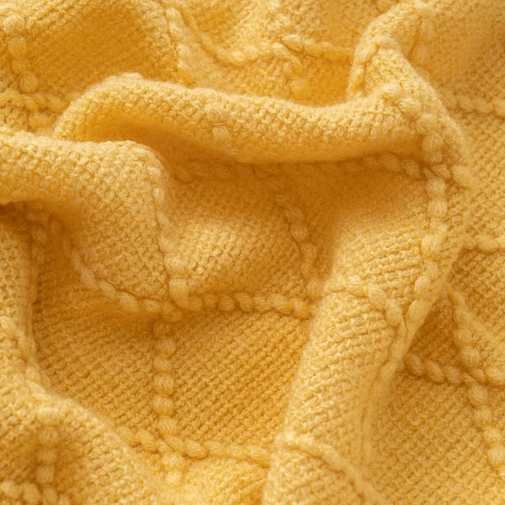 Knit Throw Blanket with Tassels in Mustard Color. Tassels closeup 2. Size 130-150 cm