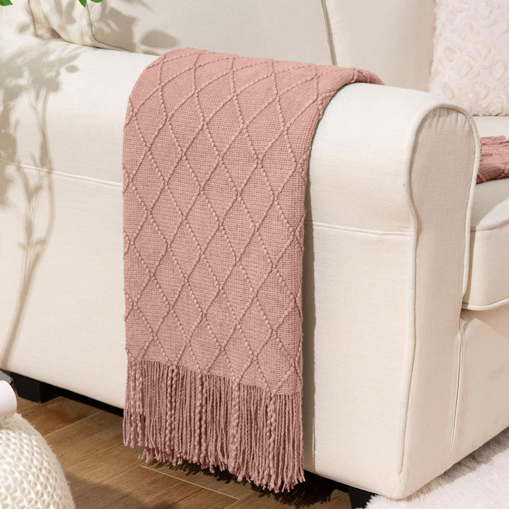 Knit Throw Blanket with Tassels in Rose Color. On sofa 2. Size 130-150 cm