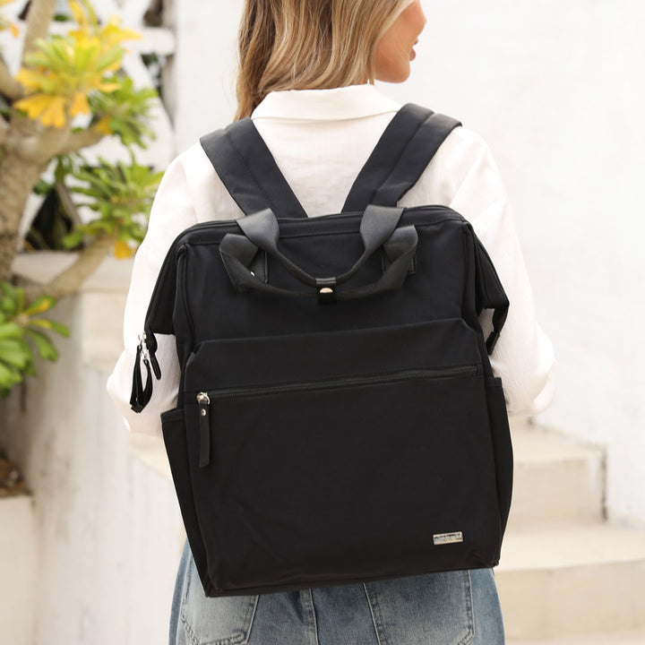 Melbourne Carry All Nappy Bag Backpack - Black Front on Mum 1
