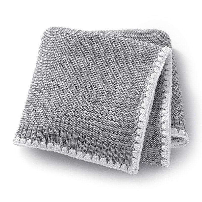 Ren Knitted Baby Blanket Folded. Size 90x70 cm