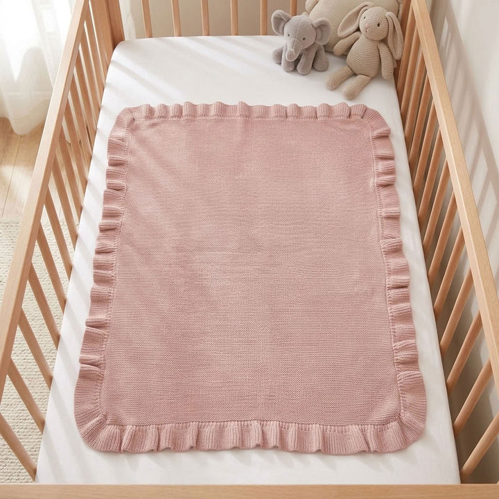 Taylor-Baby-Blanket-in-cot