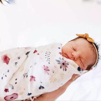 Bloom Baby Swaddle Wrap with baby