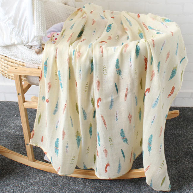 Feathers Baby Swaddle Wrap on Bassinet