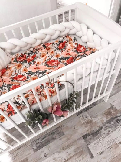Floral Baby Swaddle Wrap in cot