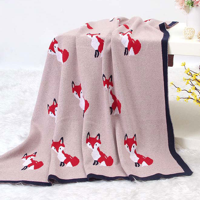 Fox Rose Baby Blanket in Bassinet