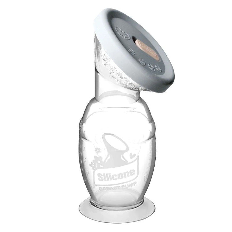 Haakaa Silicone Breast Pump & Cap Combo with lid on