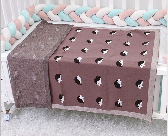 Hedgehog Baby Blanket in cot