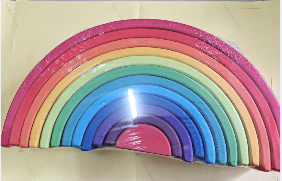 Large 12 piece Wooden Rainbow Stacker in packaging