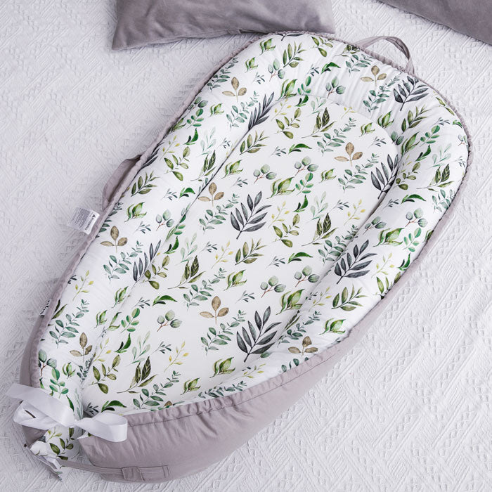 Spring Leaves Baby Nest Lounger & Cocoon on rug