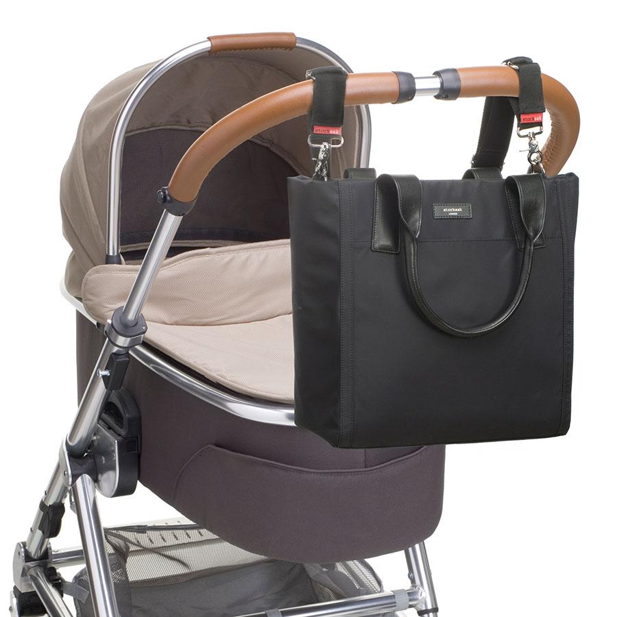 Storksak Eliza Black Nappy Bag on pram