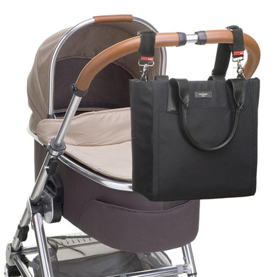 Storksak Eliza Black Nappy Bag on pram