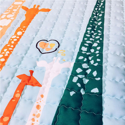 Tall Giraffes Baby Play Mat print closeup